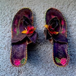 Corey’s leather brown floral sandals.  Slightly worn, smoke free home.